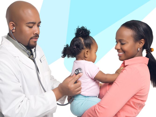 A doctor listens to a baby's heart