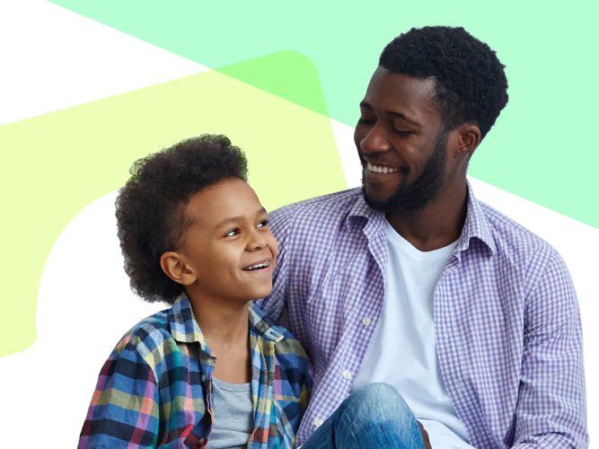 A parent smiles at their child