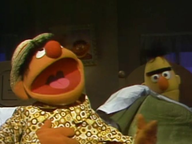 Bert and Ernie singing.