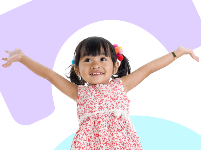 Child with their hands in the air.