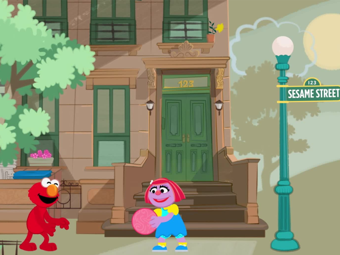 Elmo playing ball with Katie.